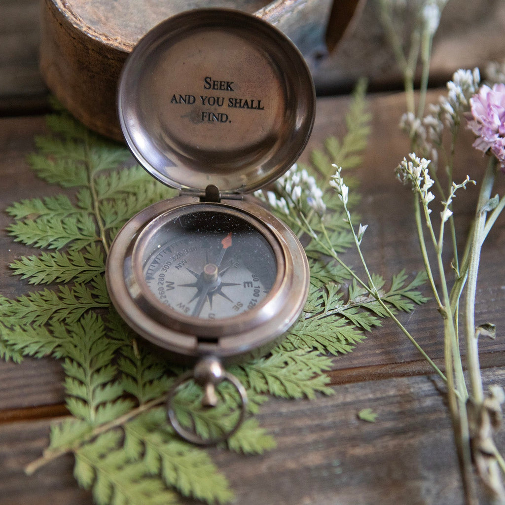Seek and You Shall Find Push Button Compass with Leather Pouch
